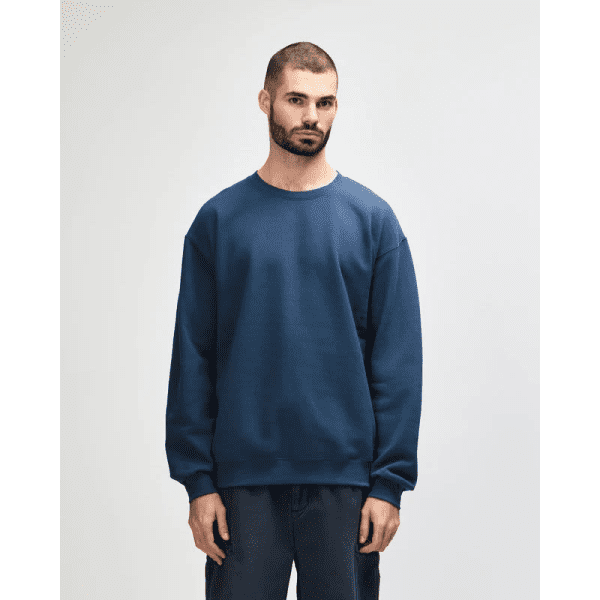 A blue heavyweight crewneck jumper for adults, featuring a simple design and a branding logo.