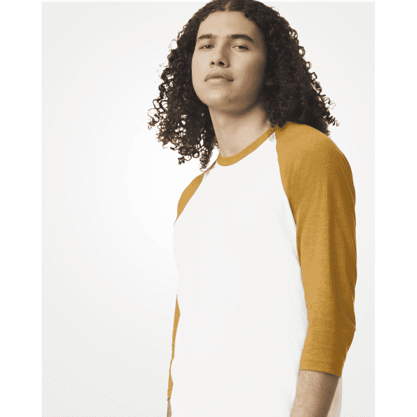 A unisex raglan T-shirt featuring white body and mustard yellow sleeves, with a logo on the front.