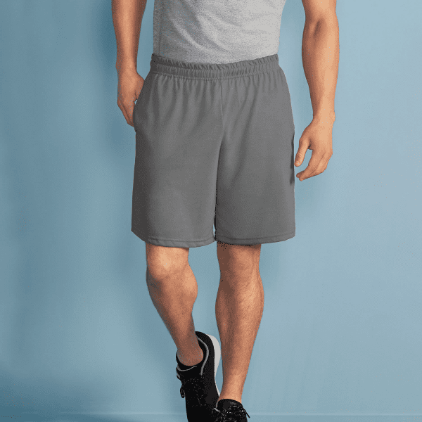 Performance adult shorts in grey, featuring an elastic waistband and a relaxed fit. Suitable for sports activities.