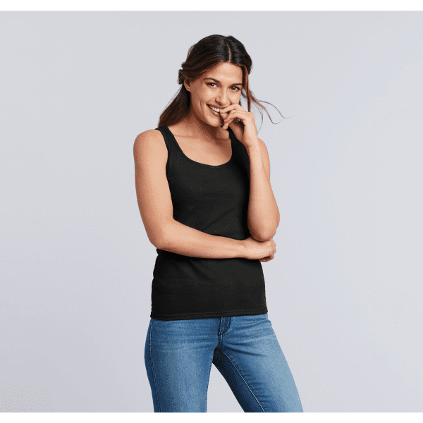 A black ladies' tank top worn by a woman with long hair, paired with blue jeans. The top features a logo.