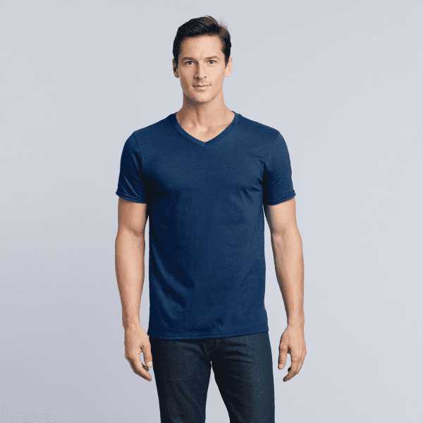 Navy blue Softstyle adult V-neck T-shirt displayed on a model against a plain background.