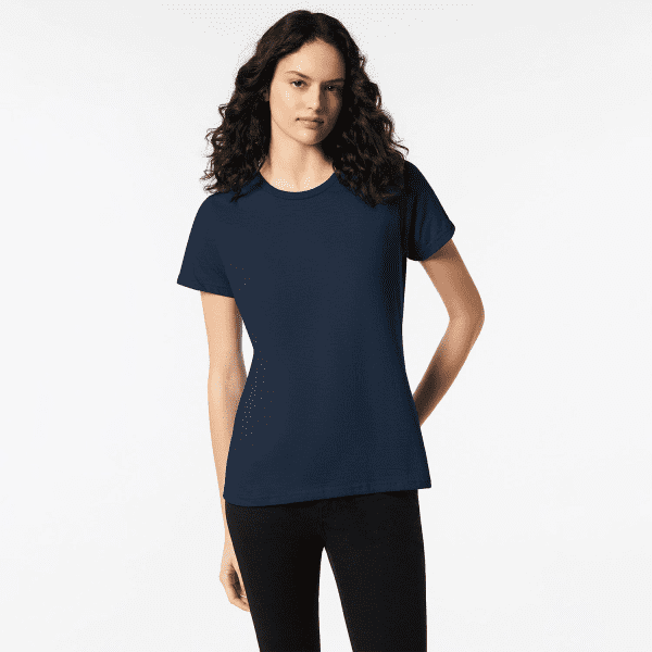 A navy blue softstyle ladies midweight T-shirt displayed on a model. The shirt features a crew neck and short sleeves.