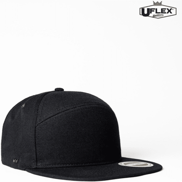 A black six-panel snapback cap with a logo, featuring a flat brim and an adjustable strap at the back.