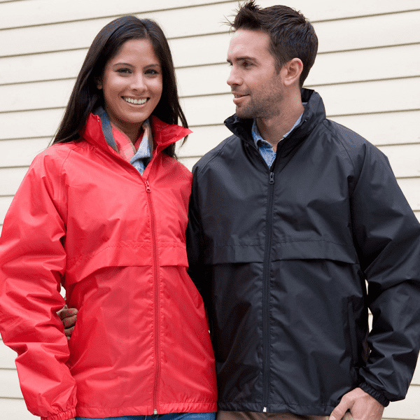 A red women's lightweight rain jacket and a black men's lightweight rain jacket, both featuring a logo.