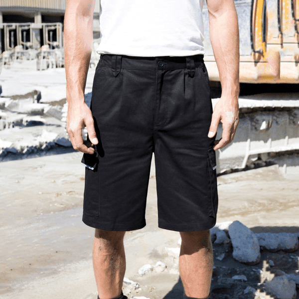 Black work shorts designed for adults, featuring various pockets for functionality. The material appears durable and practical.