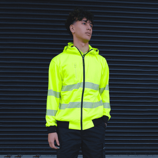 A bright yellow zipped hoodie with reflective stripes, featuring a hood and a logo on the front.