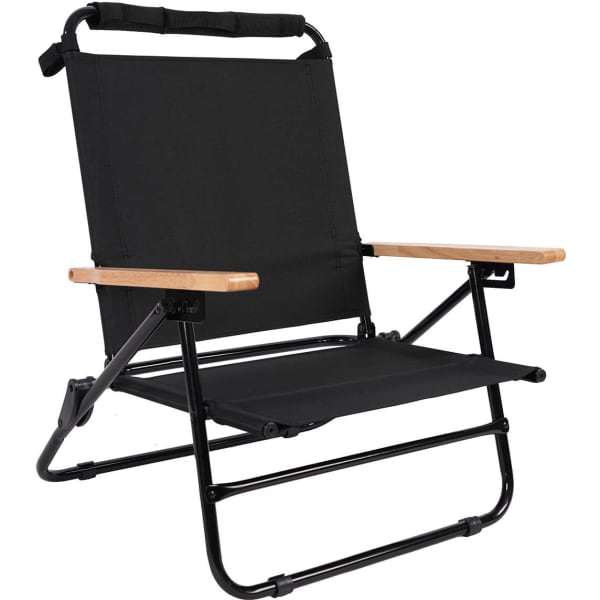 A black beach chair with a lightweight frame and wooden armrests, featuring a simple, folding design.