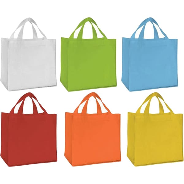 A collection of six non-woven tote bags in white, green, blue, red, orange, and yellow, all with handles and logos.
