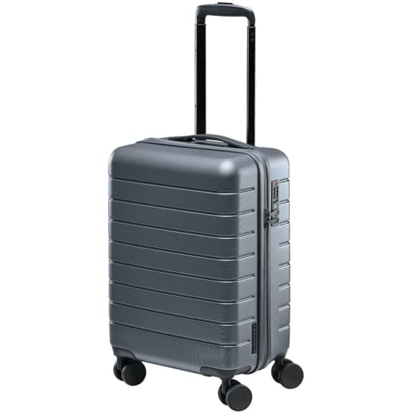 A wheeled carry-on bag in metallic grey with a textured design and a retractable handle.