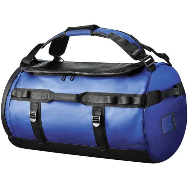A waterproof duffel bag in blue and black with multiple straps and a sturdy design, featuring a logo.