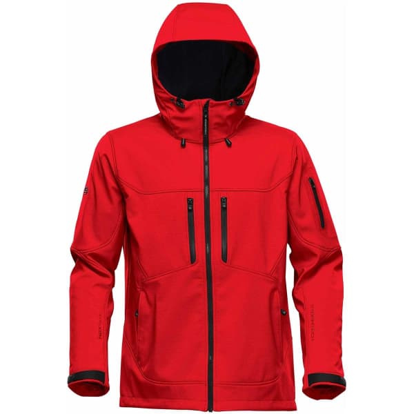 A red softshell jacket featuring a hood and multiple zippered pockets, with contrasting black accents.
