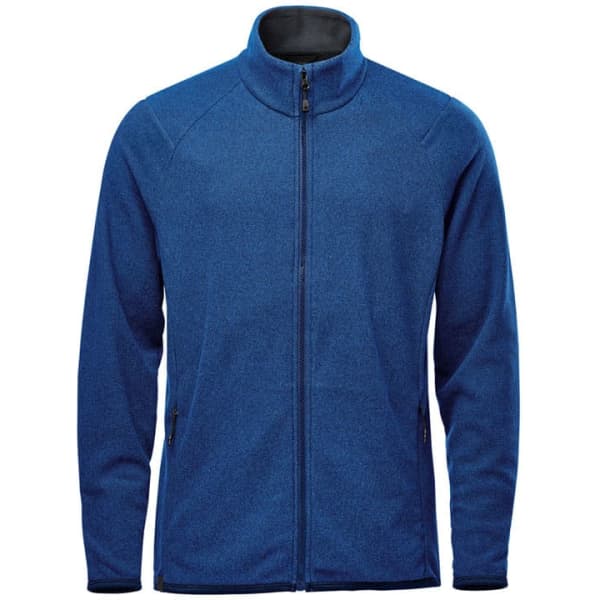 A blue men's jacket with a high collar and zip front, featuring side pockets and a subtle logo.