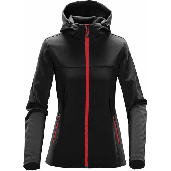 A black softshell hoody with red accents, featuring a hood and zippered pockets. It has a logo on the design.