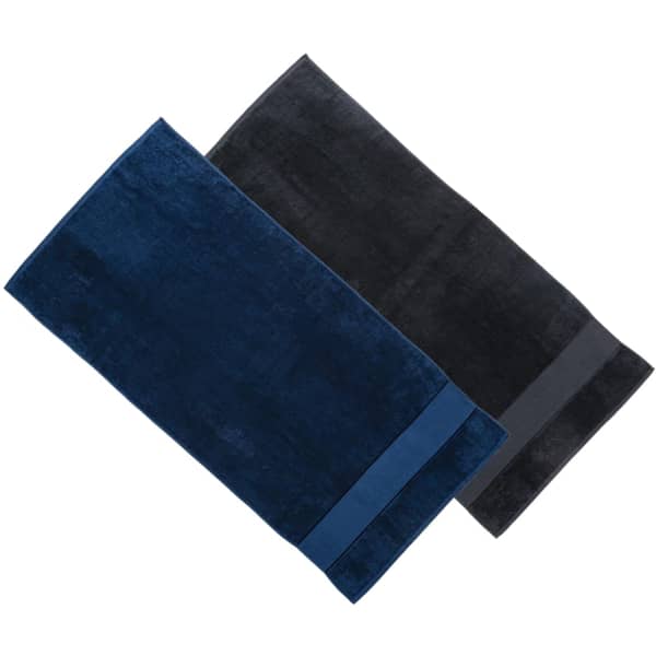 Two plush bath towels in navy blue and black, featuring a branding logo.