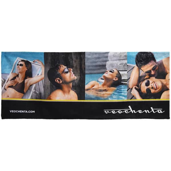 A large gym towel featuring colourful images of people relaxing and wearing sunglasses, including a logo.