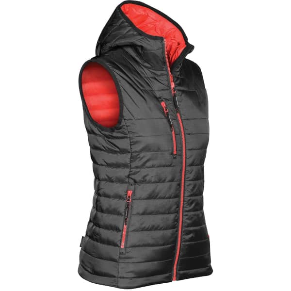 A black thermal vest with a red interior and a hood, featuring zippered pockets and a sleek design.