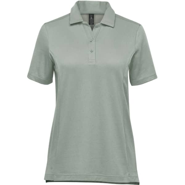 A women's polo shirt in a soft green colour, featuring a collar and short sleeves, with a logo.