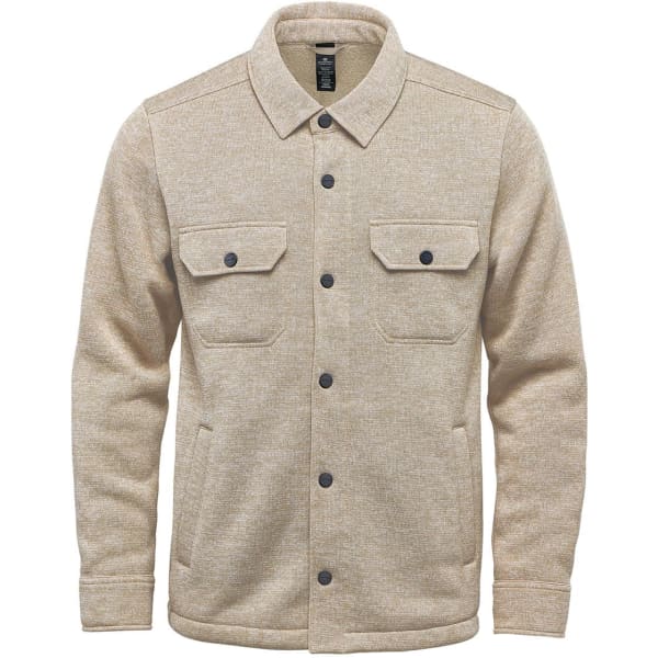A beige fleece shirt featuring two breast pockets and a branded label. Suitable for casual wear.