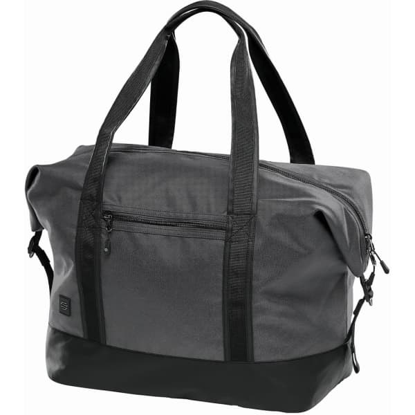 A grey duffle bag with a black base, featuring sturdy handles and zippered compartments. It has a logo visible.