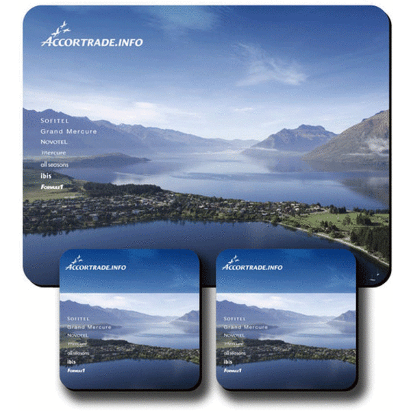 A counter mat and two coasters featuring a landscape design with blue and green hues, including a logo.