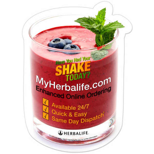 A custom-shaped gripper mat featuring a drink glass filled with a red smoothie, topped with mint leaves and blueberries.