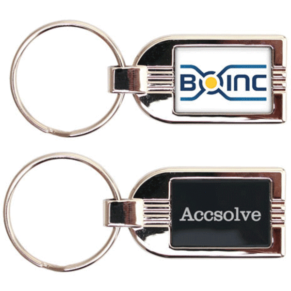 A silver metal keyring featuring two sides, one with a logo and the other in a black finish.
