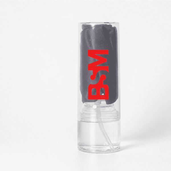 A clear container holds a dark grey cleaning cloth, featuring a logo in red.