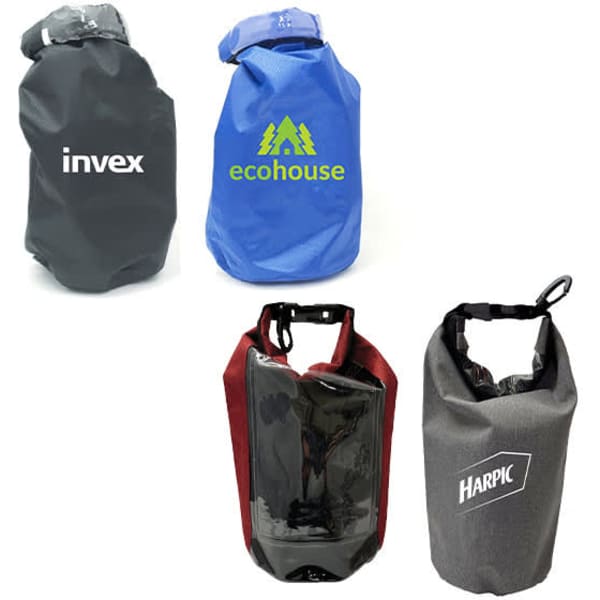 Four dry bags in different colours: black, blue, burgundy, and grey, each featuring a logo.