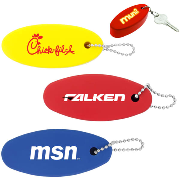 A collection of floating keychains in yellow, red, and blue, each attached to a chain, with various logos.