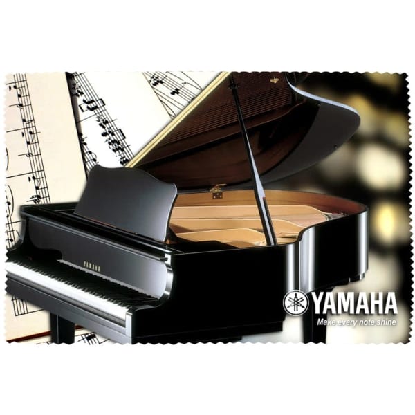 A microfibre cloth featuring a black grand piano design and a music sheet background, with a logo in one corner.