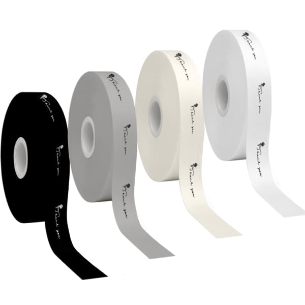 Four rolls of screen printed cotton ribbon in black, grey, white, and cream, featuring logos on each roll.