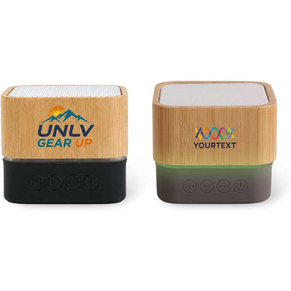 A bamboo Bluetooth wireless speaker featuring a black base and illuminated bottom. It includes a logo and control buttons.