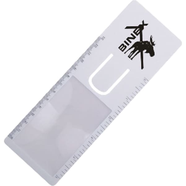 A transparent magnifying bookmark with a ruler along one edge and a logo in black.