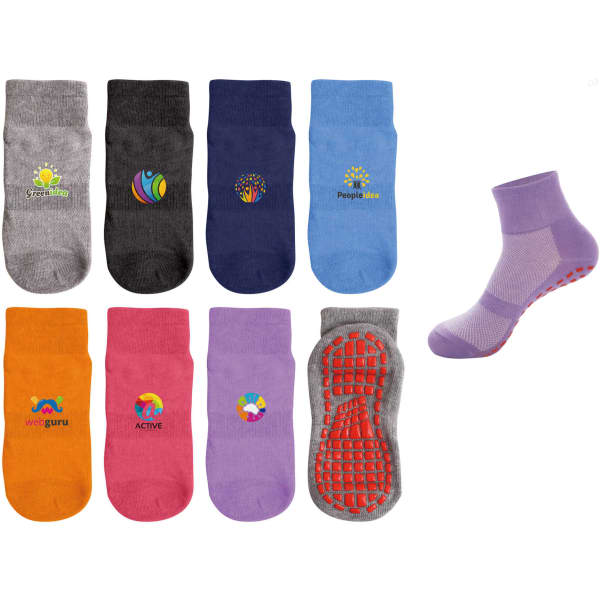 A variety of crew socks in grey, navy, orange, pink, purple, and a single purple sock with a gripper sole.