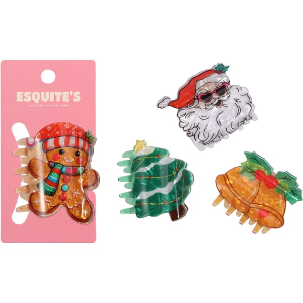 A set of three Christmas-themed hair claws in gingerbread, Santa, and Christmas tree designs, featuring vibrant colours.
