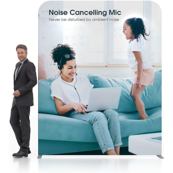 A 2m straight tension fabric display wall featuring a woman using a laptop on a sofa, with a child playing nearby.