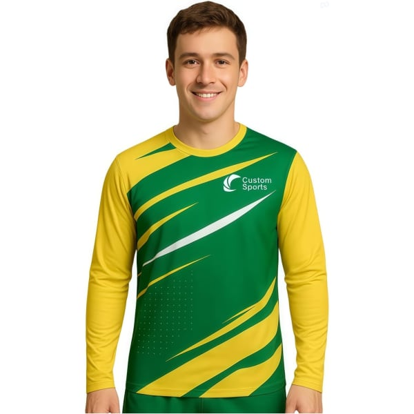 A long sleeves sports shirt in green and yellow, featuring a logo and dynamic design elements.