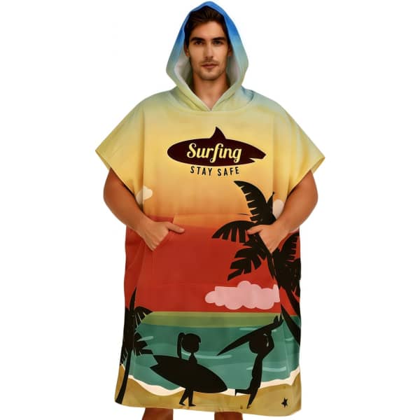 A colourful surf poncho with a hood, featuring a beach scene and palm trees, designed for comfort and style.