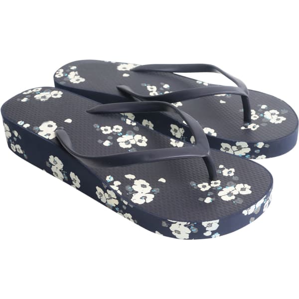 Rubber platform thongs in navy with a floral pattern, featuring black straps and a textured sole.