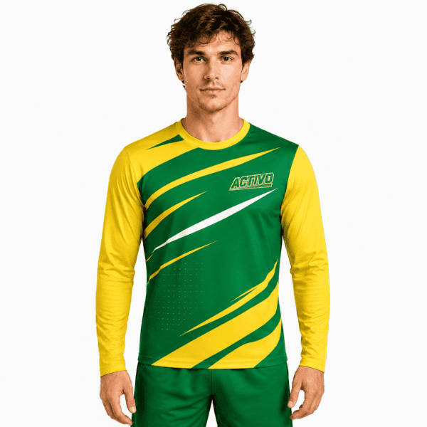 A long sleeve sports shirt in green and yellow with a diagonal pattern and a branding logo.
