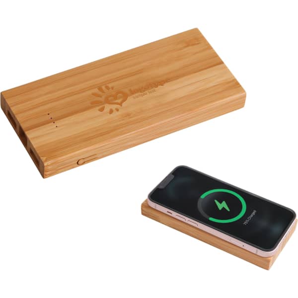 A bamboo wireless power bank in natural wood finish, alongside a smartphone displaying a charging icon.