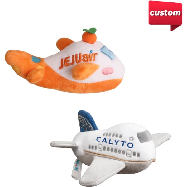 Two custom plush airplane toys, one in orange and white with a citrus accent, the other in white and blue, featuring different designs.