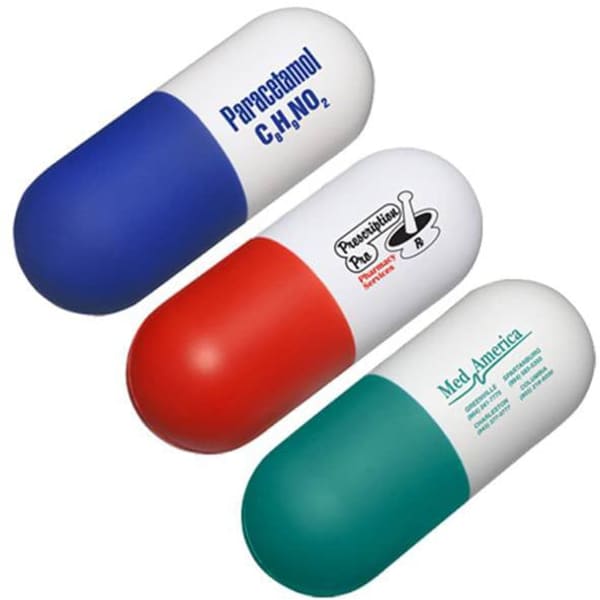 A capsule-shaped stress reliever in blue, red, and green, with a logo on one side.