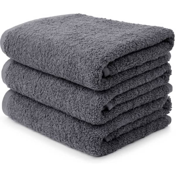 Three stacked large hand towels in a dark grey colour, featuring a soft and plush texture.