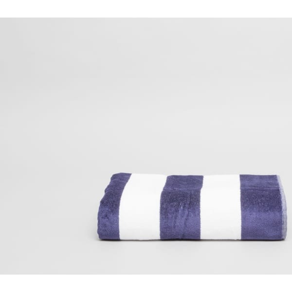 A navy and white striped towel, neatly folded, featuring a logo. 