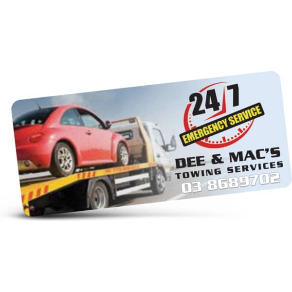 A promotional sticker featuring a tow truck with a car, predominantly in blue and yellow colours, including a logo.