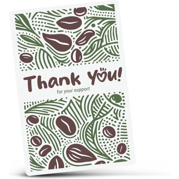 A card with a green and brown coffee bean design featuring the text 