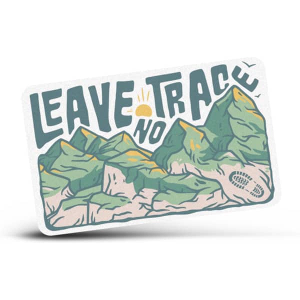 A sticker featuring green mountains and the phrase 