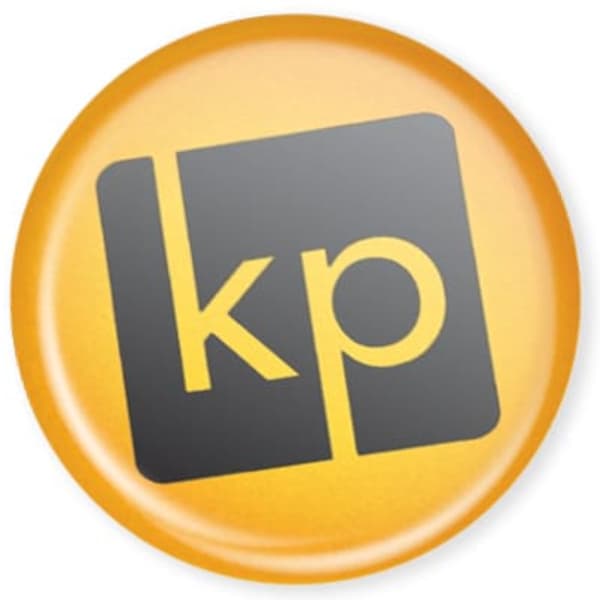 A circular resin-coated label in yellow and black featuring a logo.