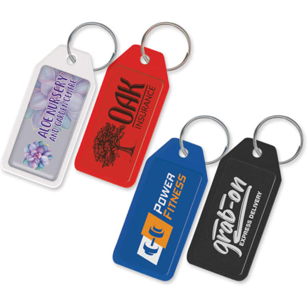 A selection of key rings in red, blue, black, and white, each featuring a different logo.